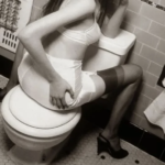 Toilet Piss Whore in College loves pissing on the phone for guys.